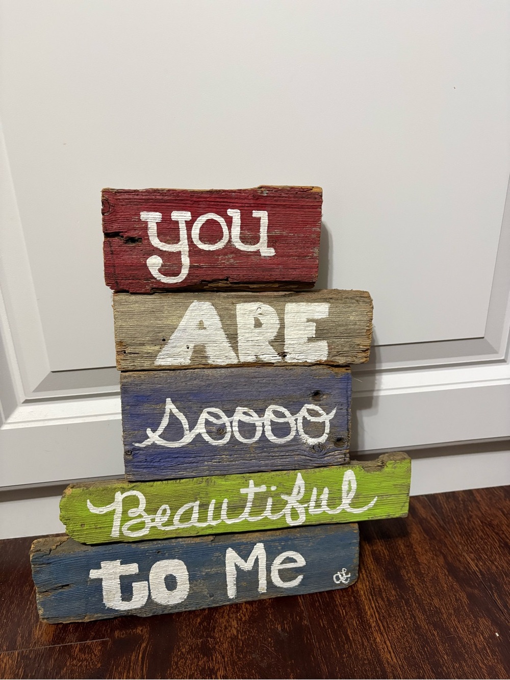 Hand-painted rustic wood sign